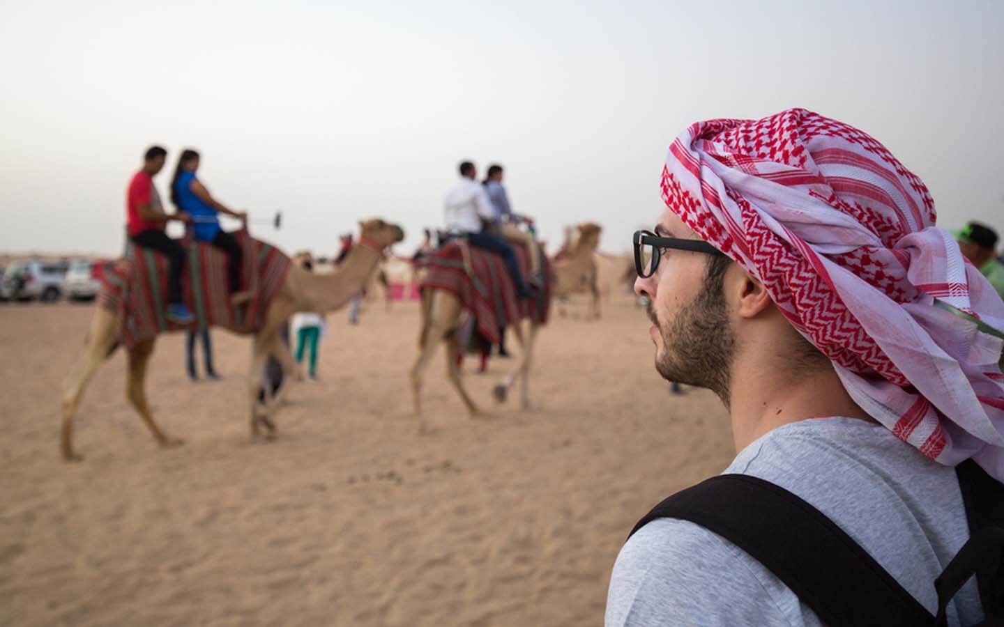 tourists-riding-camels-in-Dubai (1)